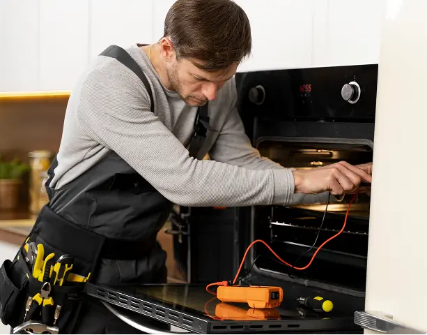 Technician at oven